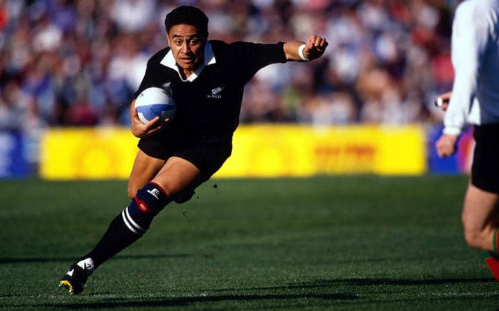 Eroni Clarke playing rugby