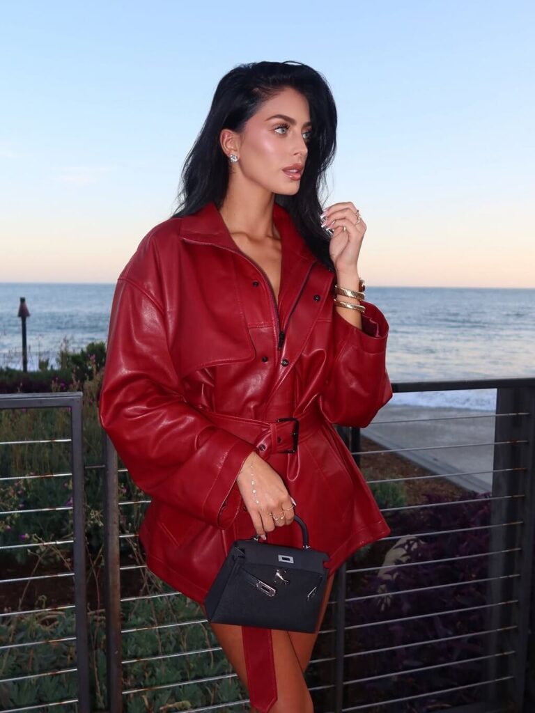 Camilla Araujo in red dress