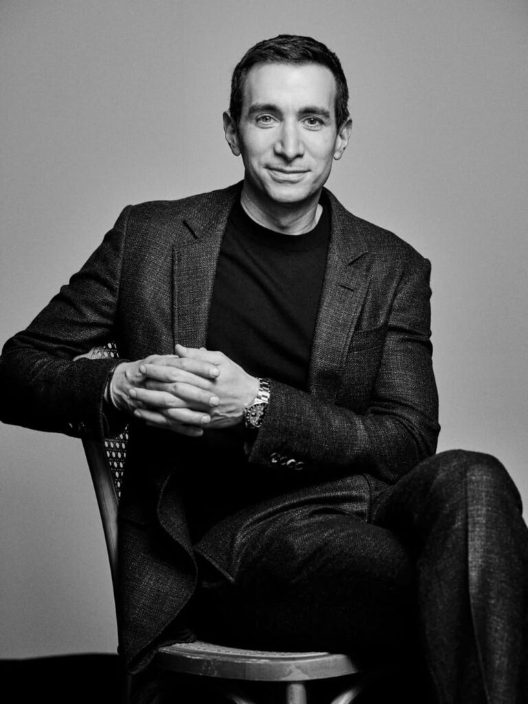Andrew Ross Sorkin on chair